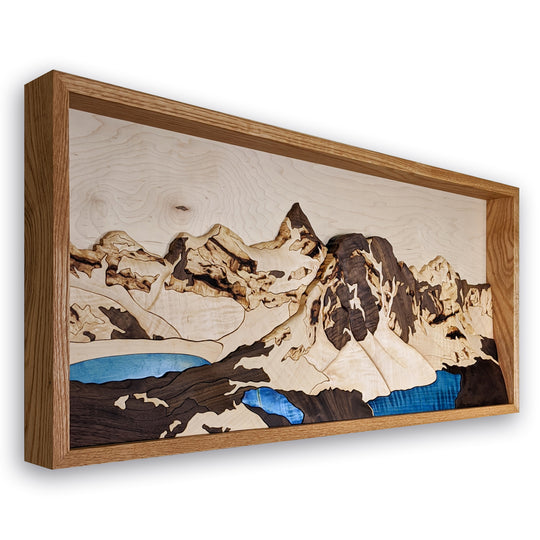Mount Assiniboine wood sculpture in 3D by Alex Jepson, highlighting nature-inspired design and expert carving techniques of this iconic Banff mountain.