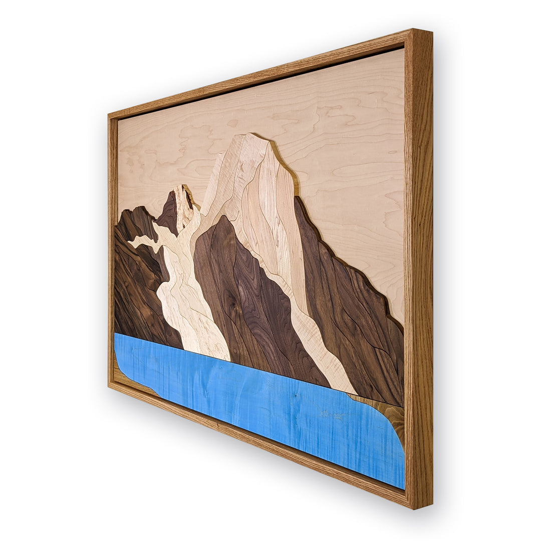 Another angle of Mount Robson and Berg Lake wood sculpture by Alex Jepson, emphasizing nature-inspired design and expert wood carving techniques.