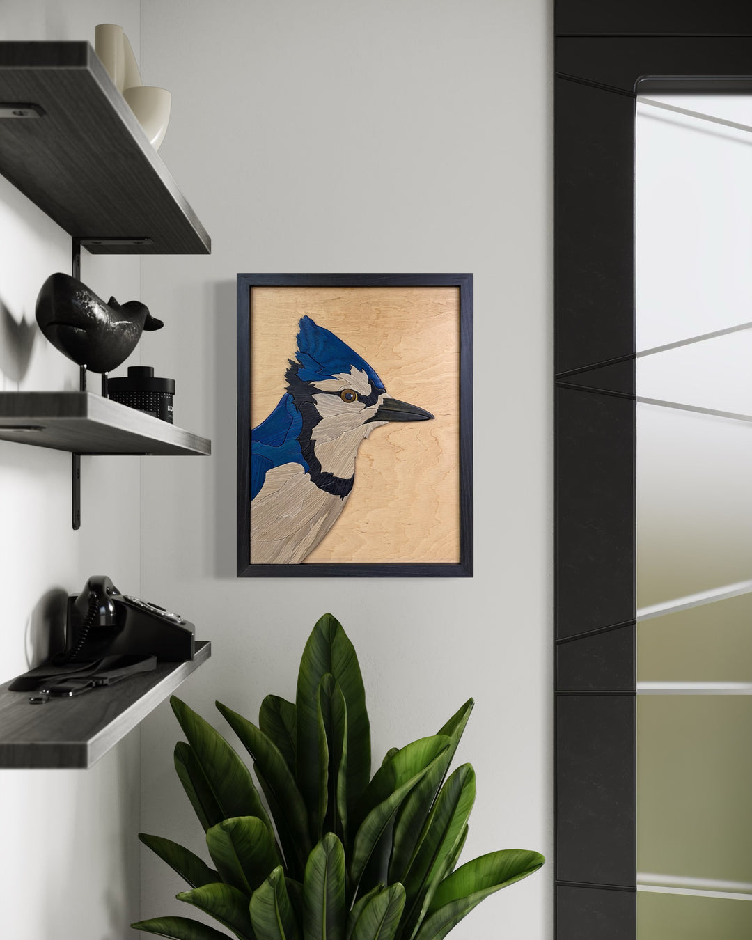 Watchful Blue Jay wood sculpture by Alex Jepson displayed in a luxury home setting, capturing the bird’s vibrant colors and expert craftsmanship for a unique piece of décor.